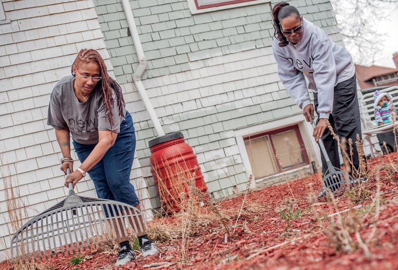 Volunteers work on the upkeep of the property.