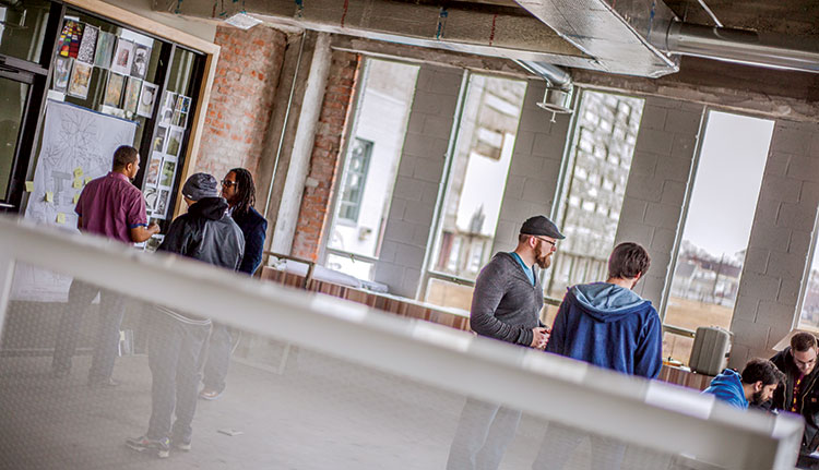 In 2011 Cooley created Ponyride, a co-working space for businesses and nonprofits. much of the building material to rehab the warehouse is recycled. The tenants who participate in community outreach programs can reduce their rent.