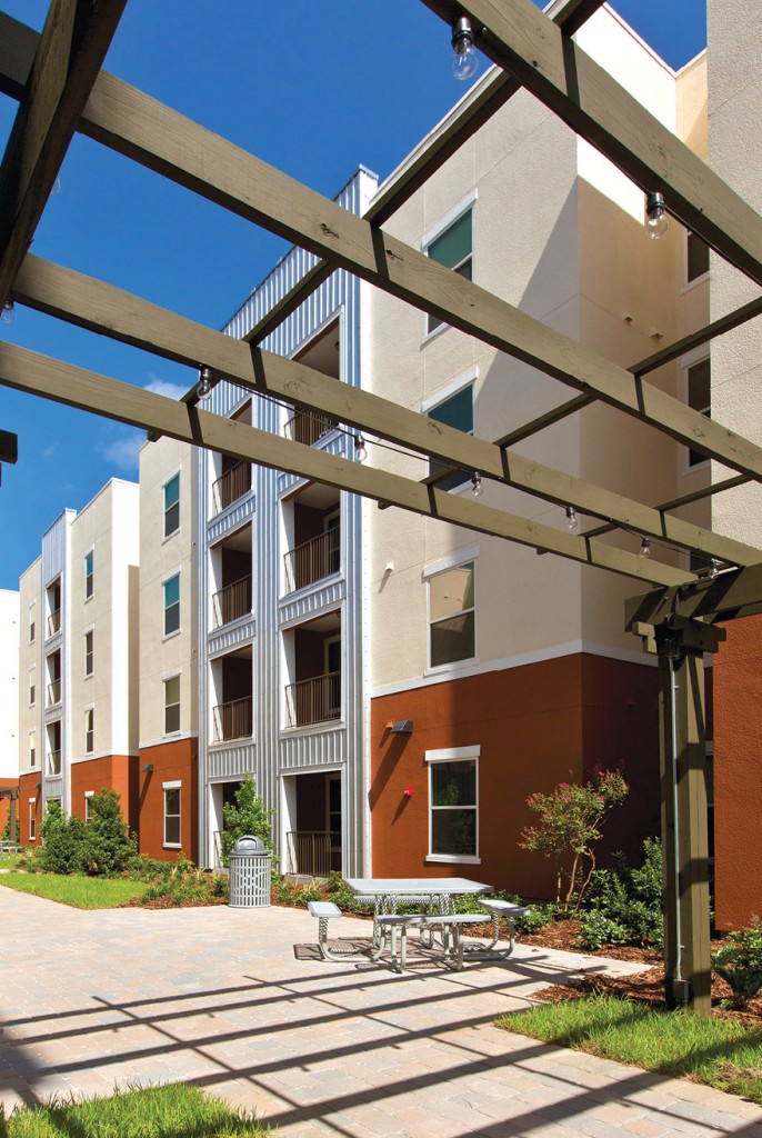 The LEED Gold University of South Florida Apartments student-housing project in Tampa, Florida, by The Dinerstein Companies, consists of two 4-story  mid-rise buildings with 182 apartment units and 24 townhomes.   Photo: Laurence Taylor
